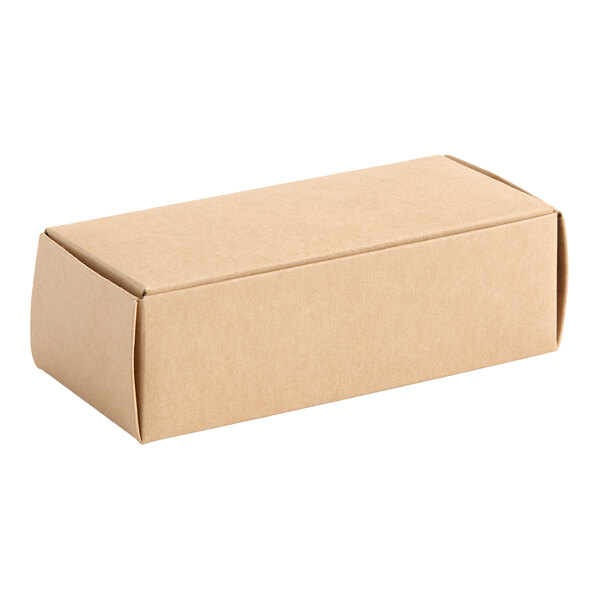 A rectangular kraft paper candy box measuring 5 1/2 by 2 3/4 by 1 3/4 inches.