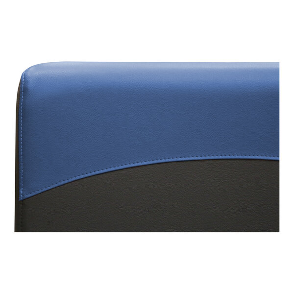 A close-up of a dark blue and black leather cover on a QA Group booth.