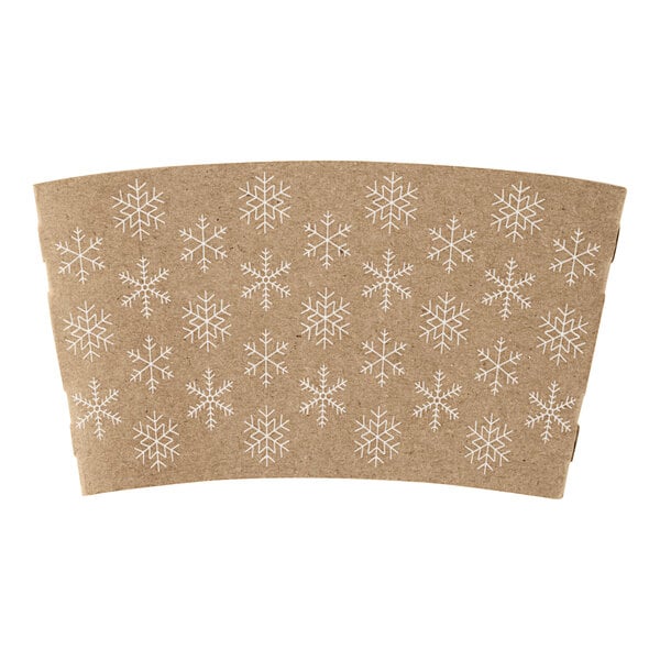 A brown cardboard coffee cup sleeve with white snowflakes.