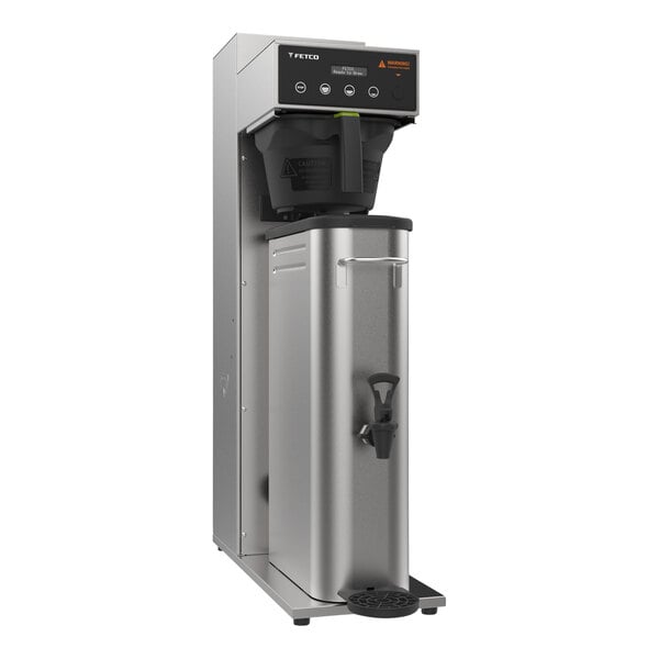 A silver stainless steel Fetco Extractor Plus single tea brewer on a counter.