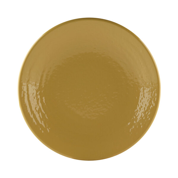 A close up of an olive oil-colored Elite Global Solutions pebble textured round plate.