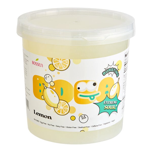 A plastic container of Bossen Sour Lemon Bursting Boba with yellow liquid and white text.