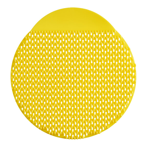 A yellow circular F-Matic AirFin urinal screen with a pattern of white dots.