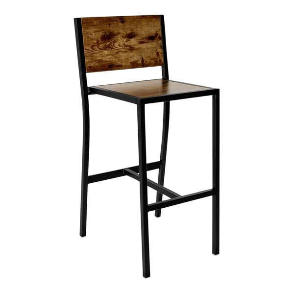 A BFM Seating Chester barstool with a wooden seat and back and black metal legs.