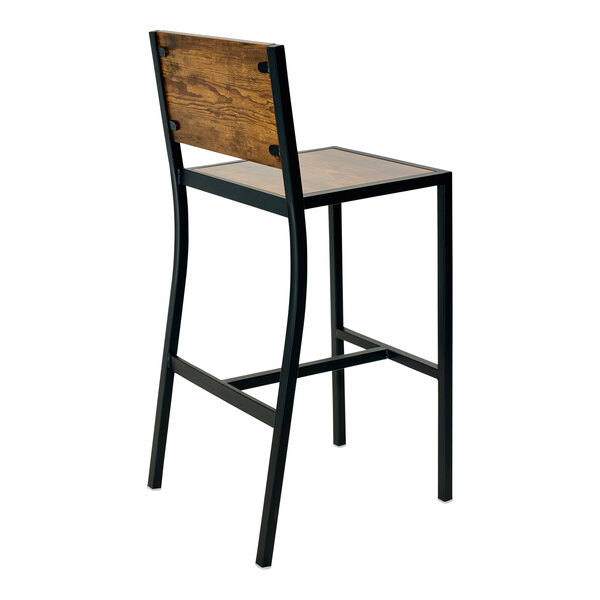 A BFM Seating black powder-coated steel barstool with a wood seat and back.
