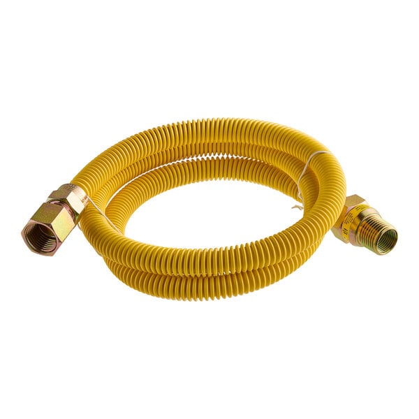 A yellow hose with a brass nut.