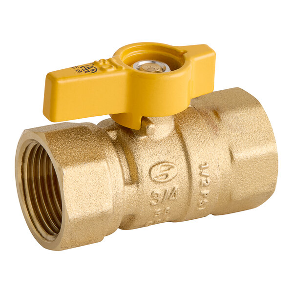 A close up of an Eastman brass gas valve with a yellow lever handle.
