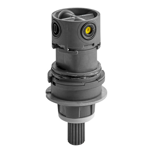 An American Standard pressure balance cartridge for a shower rough-in valve with a grey plastic center and black and yellow accents.