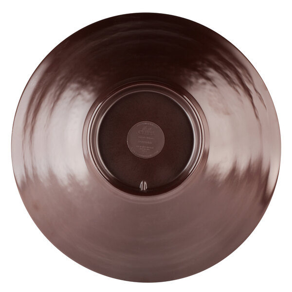 An abyss-colored melamine bowl with a circular pattern in the middle.