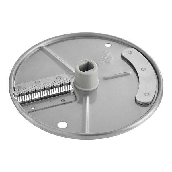 A circular metal plate with a white plastic cover.