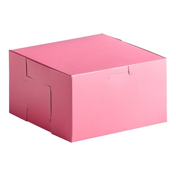 A pink Southern Champion cake box with a lid.