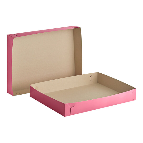 A pink Southern Champion cake box with a lid open.