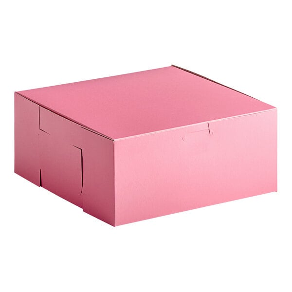 A pink Southern Champion cake box with a lid.