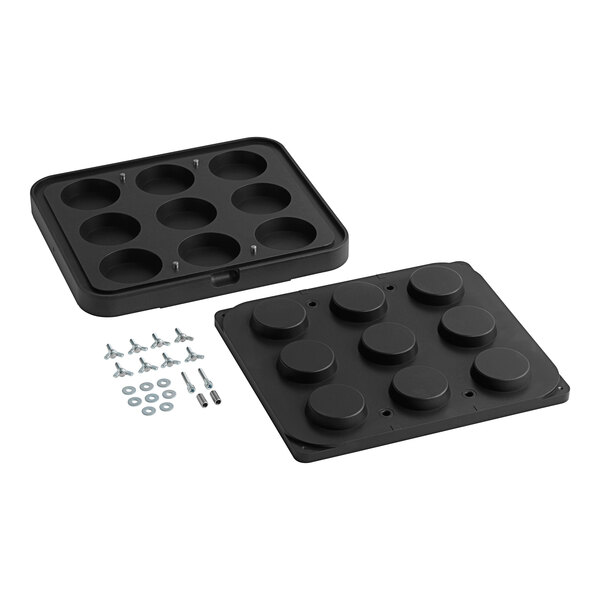A black plastic mold with round holes for 9 round cavities.