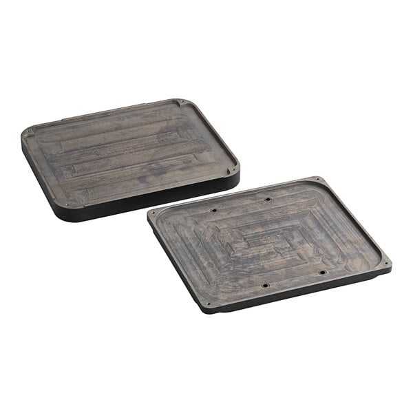 A black rectangular object with a wooden surface with 9 round metal cavities.