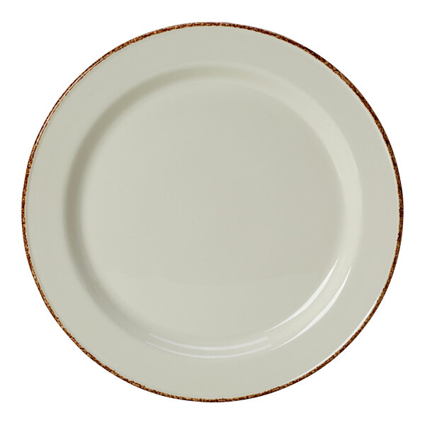 A white plate with brown speckled rim.