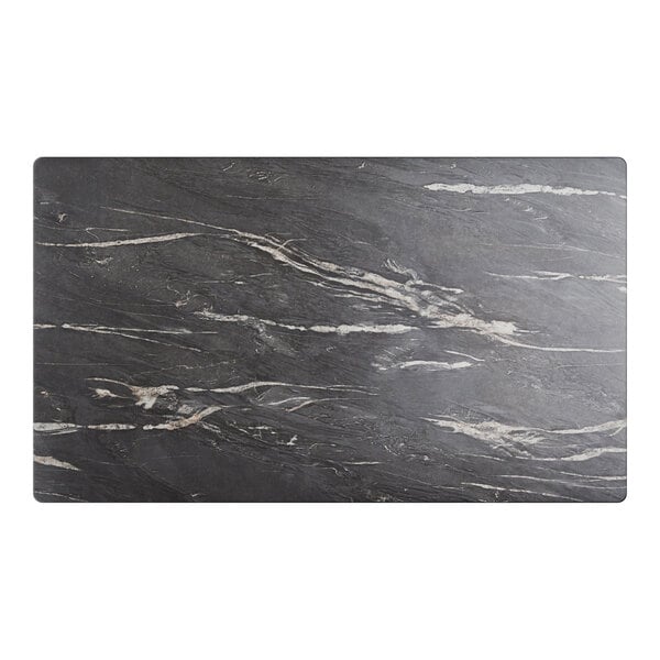 A rectangular table top with a smooth, dark Letizia finish and subtle light veining.