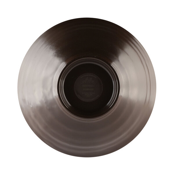 A black melamine bowl with a black circle in the middle with white text.