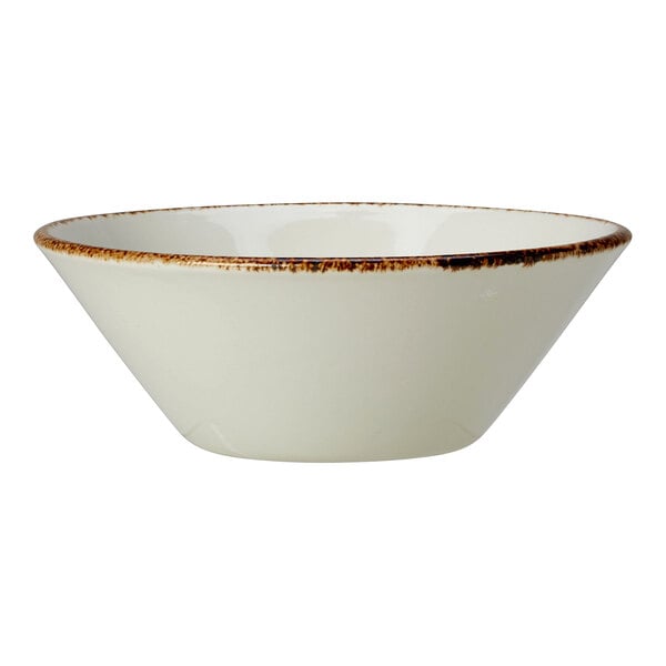 A white Steelite Performance bowl with brown specks on the rim.