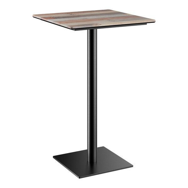 A Lancaster Table & Seating bar height table with a square wooden top and metal base.