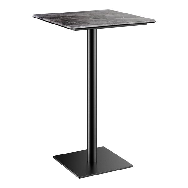 A black table with a marble top and square base plate.