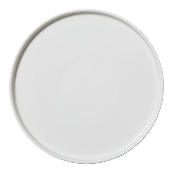 A close-up of a Steelite Performance Taste white plate with a circular rim.