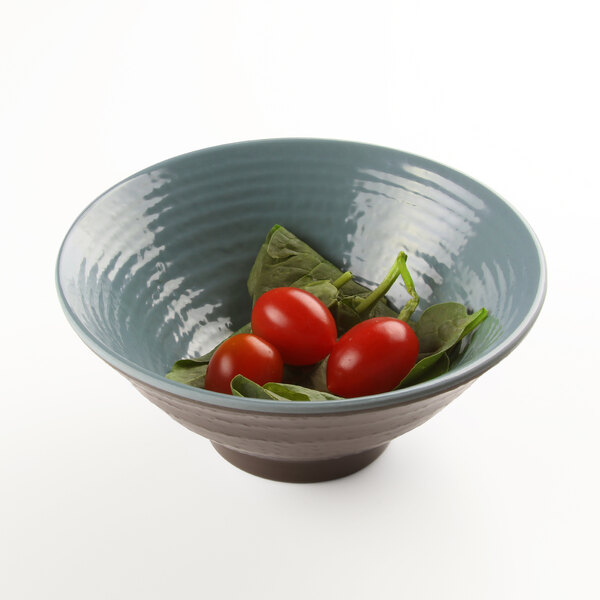 An Elite Global Solutions Pebble Creek Abyss-colored melamine bowl filled with tomatoes and spinach.