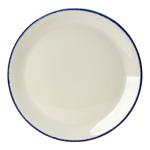 A white Steelite Performance Blue Dapple coupe plate with a blue rim.