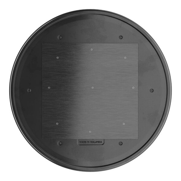 A black circular Lancaster Table & Seating Excalibur table top.