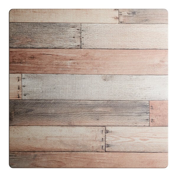 A square table top with a textured mixed plank wood finish.