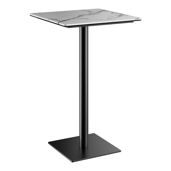 A Lancaster Table & Seating bar height table with a white marble top and black square base.