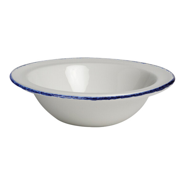 A white Steelite china bowl with a blue dapple rim.