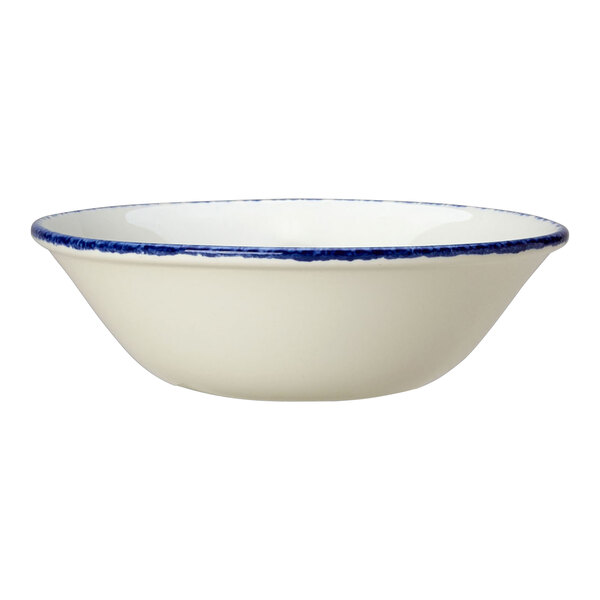 A white Steelite oatmeal bowl with a blue dappled rim.