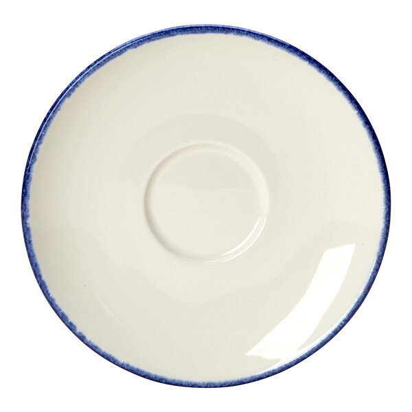 A close-up of a Steelite Performance Blue Dapple saucer with a white background and a circular blue and white design.