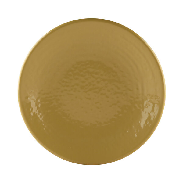 A yellow round melamine plate with a pebble texture.