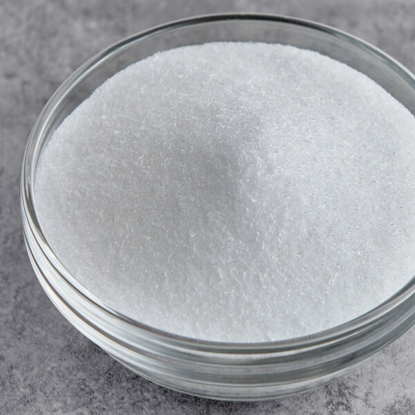 A bowl of Badia MSG powder.