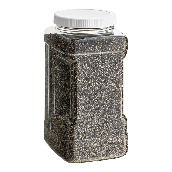 A stone container of Badia Table Grind Black Pepper with a white lid.