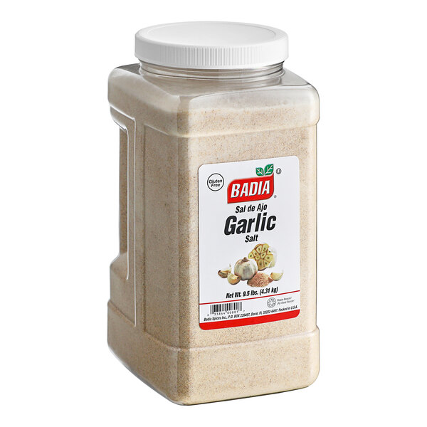 A container of Badia Garlic Salt with a white label.
