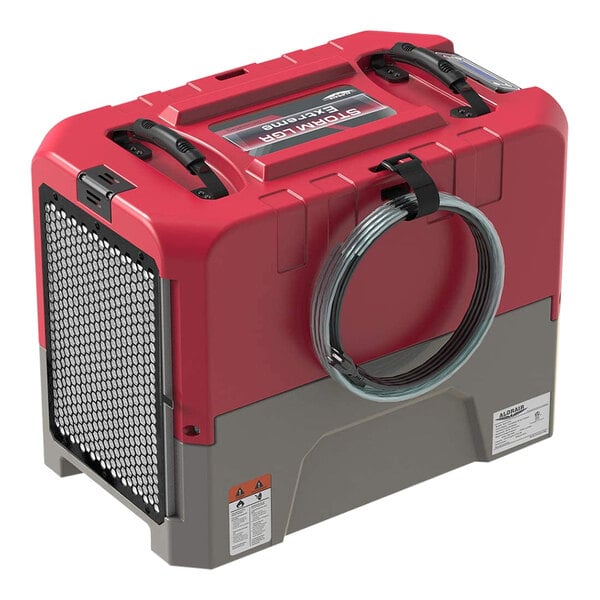 An AlorAir Storm Extreme LGR red and grey dehumidifier with a wire attached.
