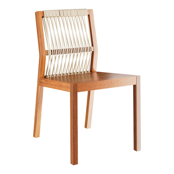 A wooden chair with a rope backrest.