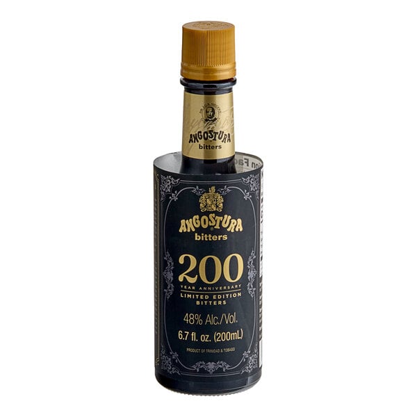 A close up of a black Angostura bottle with gold text.