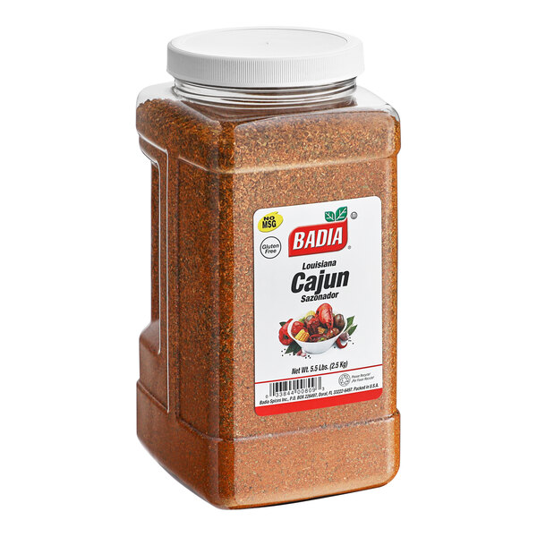 A white container of Badia Cajun-Style Seasoning with a label.