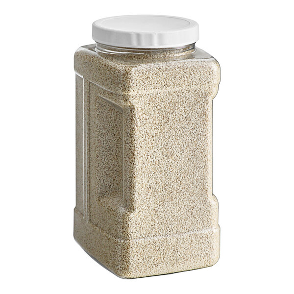 A white plastic container of Badia White Sesame Seeds with a white lid.