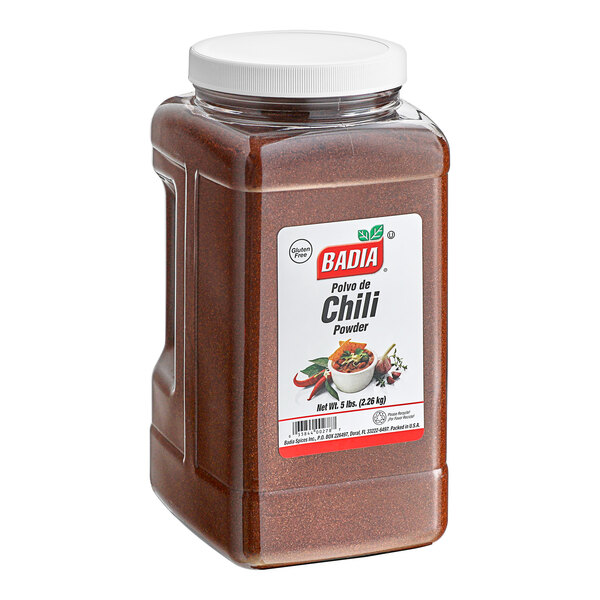 A case of Badia Chili Powder containers.