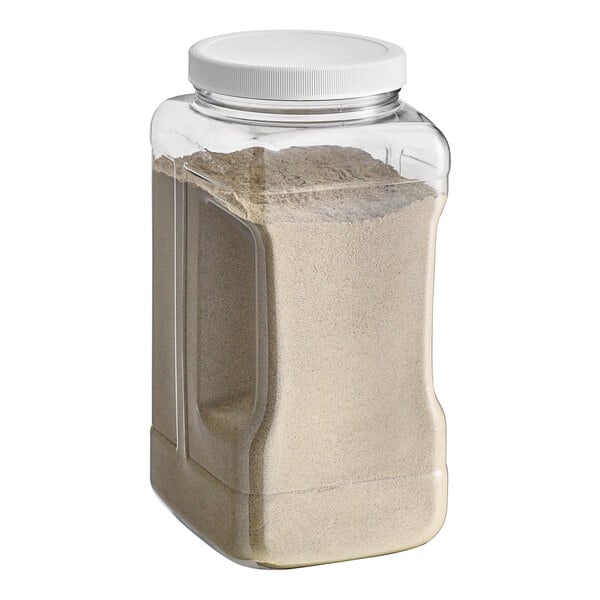 A plastic container of Badia Ground White Pepper with a white lid.