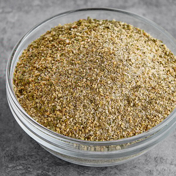 A bowl of Badia Complete Seasoning.
