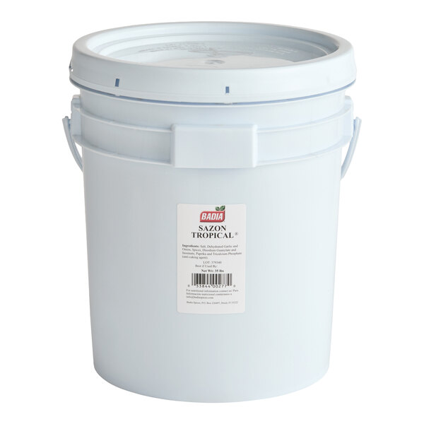 A large white plastic bucket with a handle and a label on the front.