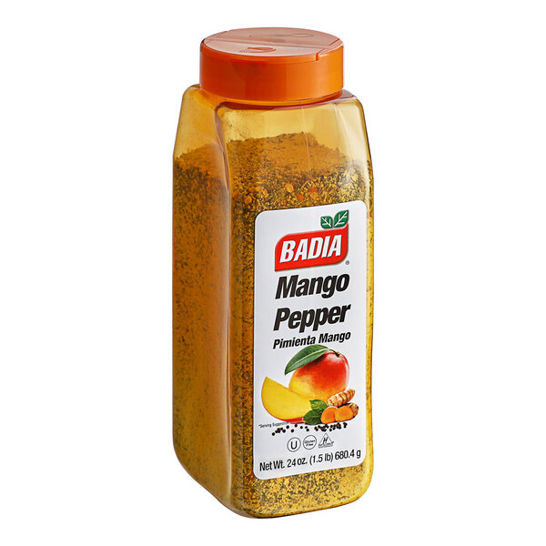 A plastic container of Badia Mango Pepper with a label.