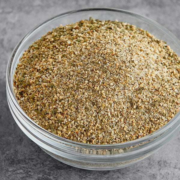 A bowl of Badia Complete Seasoning on a table.