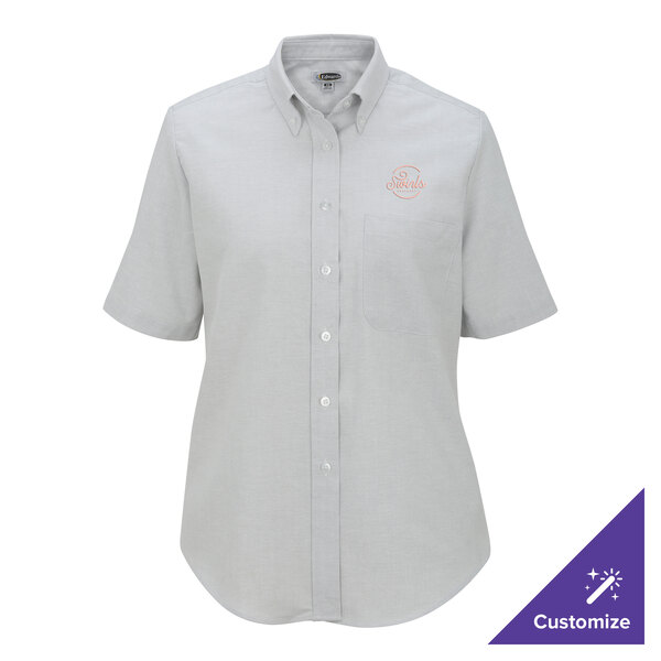 A women's light gray short sleeve button-up dress shirt with a front pocket and customizable logo, shown in size XL.